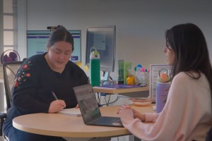 Advisor with student