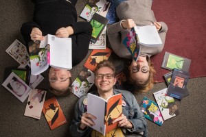 Kenyon Review student associates show off editions of the famous literary magazine.