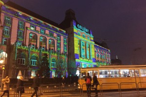 The image shows a picture of Budapest at night
