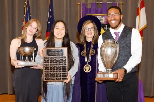 Student award recipients with President Kornfeld