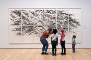 Visitors interact with Julie Mehretu’s Auguries, 2010 at the Gund Gallery. Photo by Alan Geho. Image courtesy of the Gund Gallery at Kenyon College.