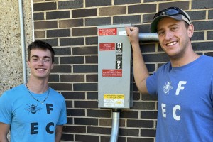 Will Pritchard ’25, left, and Josh Bergman ’25 were present when the solar power system at Gund Commons was energized on Sept. 3.