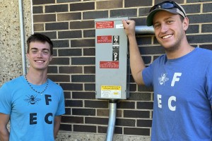 Will Pritchard ’25, left, and Josh Bergman ’25 were present when the solar power system at Gund Commons was energized on Sept. 3.