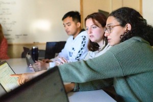 Students looking at computers