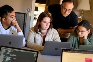 Students looking at computers