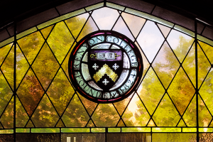 Kenyon seal in stained glass at Ransom Hall