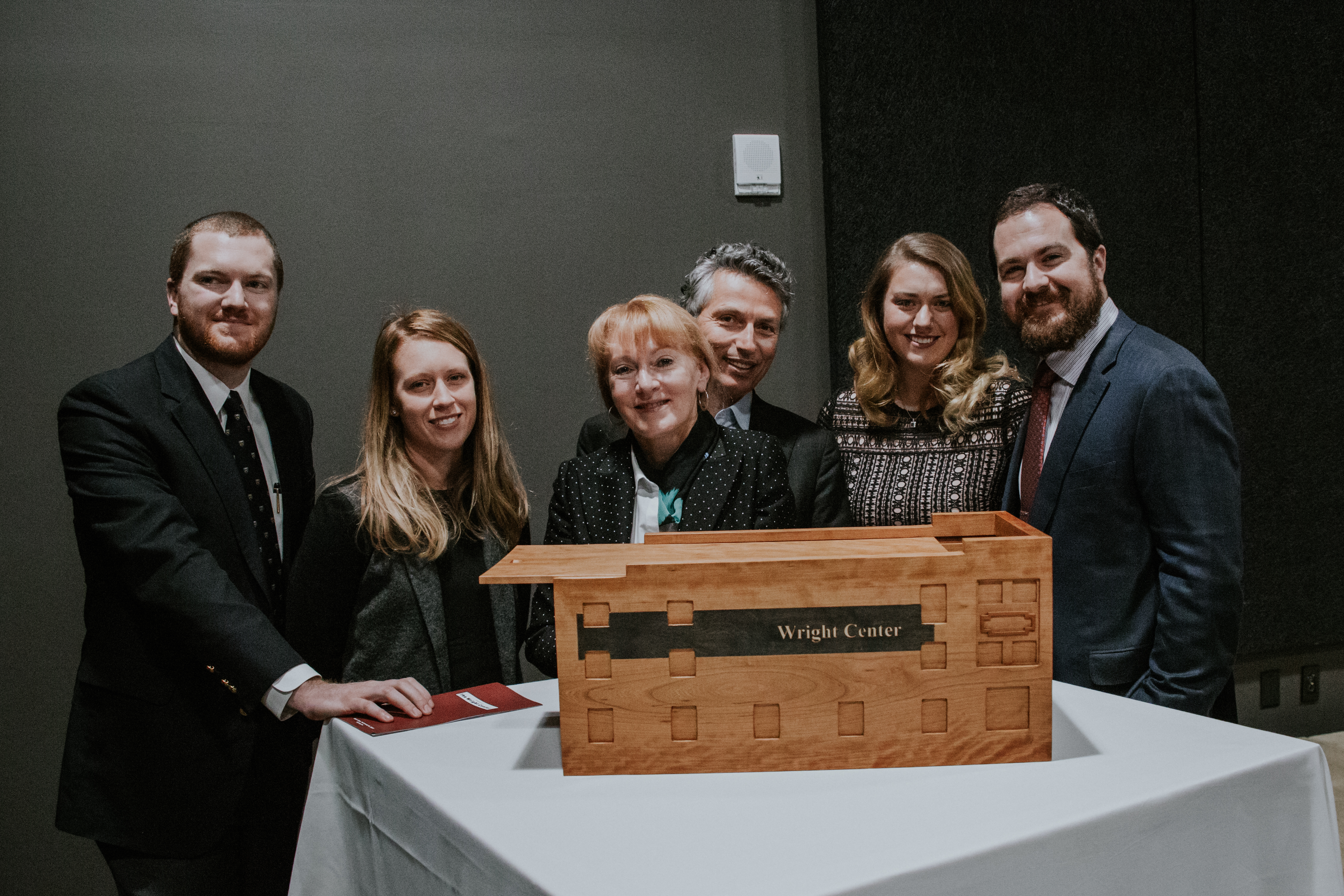 Karen Buchwald Wright P’05 ’09 H’24, center, and her family at the dedication of the Wright Center in 2017.