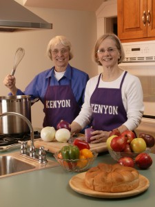 Peggy Turgeon and Joyce Klein pose in kitchen