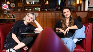 Sarah Wagner and Olivia Kane pose in the Village Inn