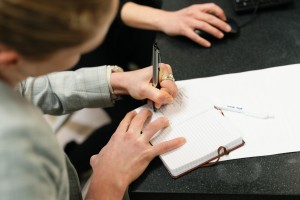 Student taking notes