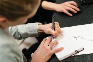 Student taking notes