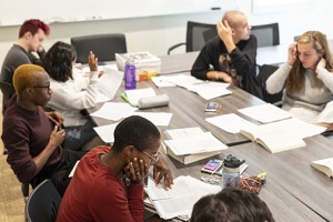 students working together around a seminar table